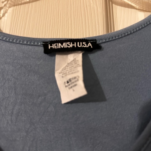 Denim blue baby doll style top. Fairly long and is short ruffle sleeves. - Picture 3 of 4